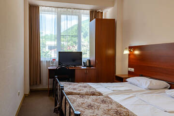 Бюджетный двухместный номер с 2 отдельными кроватями в Гостинице Машук